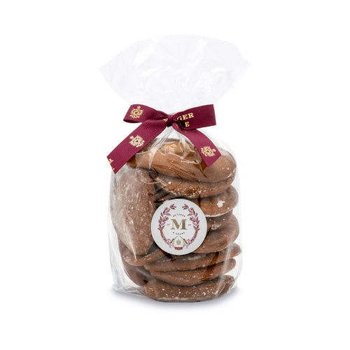 Hauslebkuchen in Klein sackl is the simplest version of the original Metzger gingerbread. Here, the honey dough is refined with spices, topped with almonds and glazed with sugar after baking.