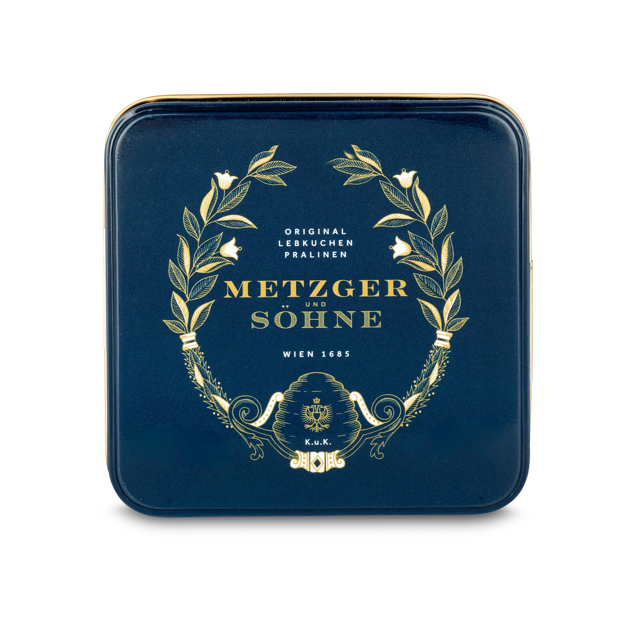 This small Metzger Lebkuchen -tin in navy impresses with a very high quality print and full colours and is filled with 9 different gingerbread chocolates.