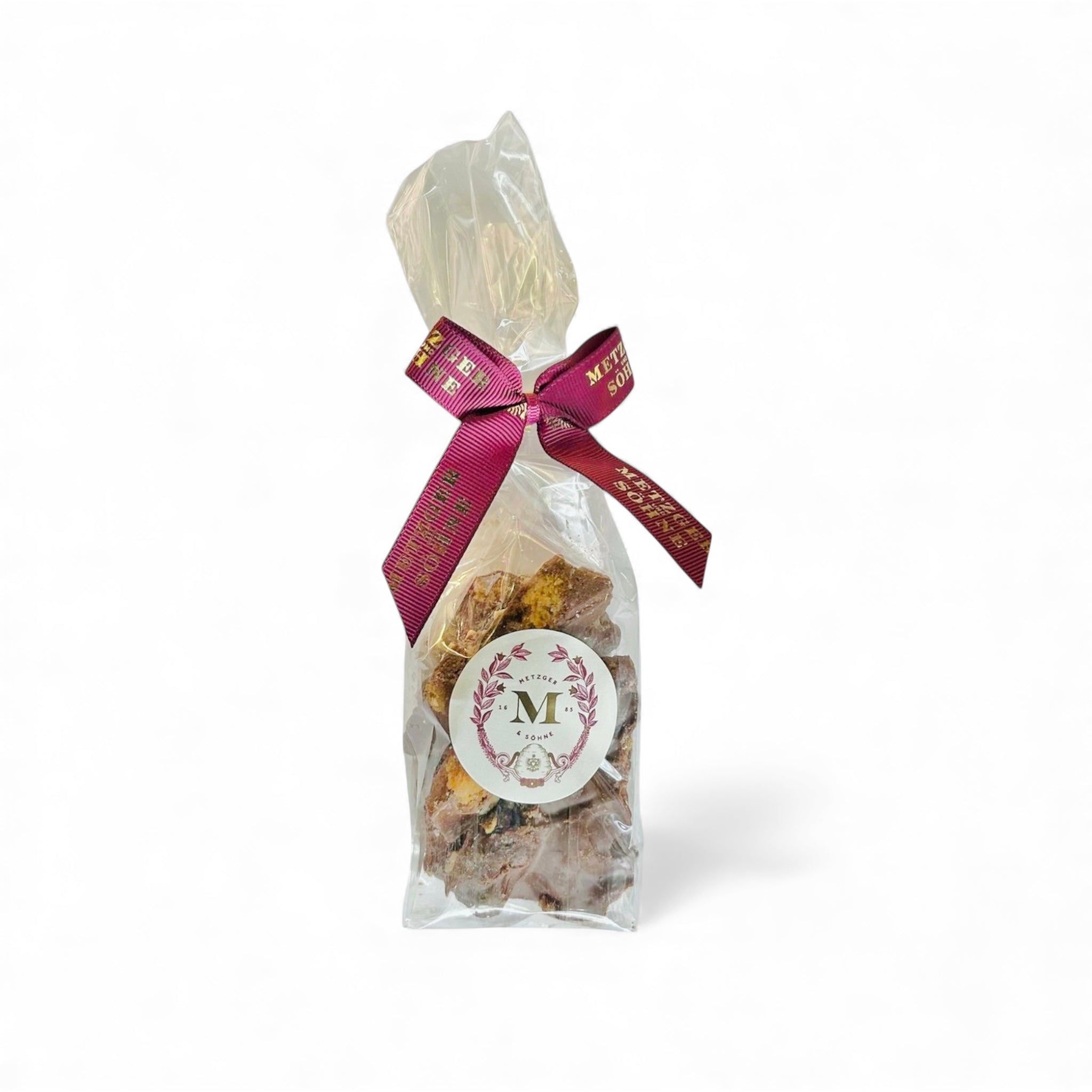 Edel Vollmilch Schokolade (42%) mit NUSS-RUM Bruch