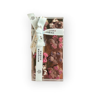 Milch Schoko Edelweiss mit kandierten Blumenblaettern