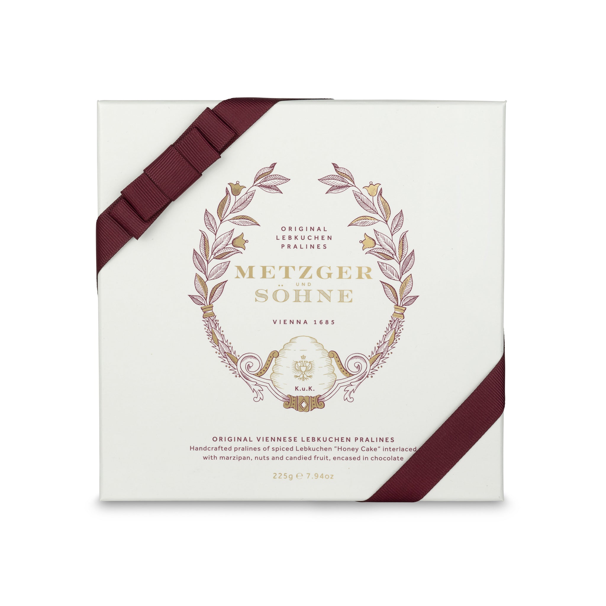 Piccola Lebkuchen Pralinen Schachtel - Weiss. Die Metzger Signatur Pralinen Schachtel ist gefüllt mit 16 hochwertigen, geschmackvoll verzierten Lebkuchenpralinen.